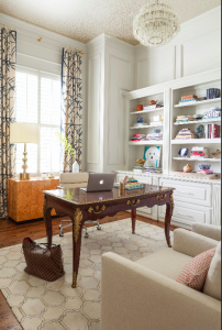 In the home office, a Nina Campbell metallic leopard print wallpaper on the ceiling adds a touch of glitz. Below, the early 19th century Louis XV French Euro desk sits on a natural cowhide rug from Interior Resources in Dallas. Decorating the bookshelves is a dog painting by one of the homeowners’ daughters—one of Pratiksha’s favorite touches because it resembles the family’s beloved pet, Roxy.